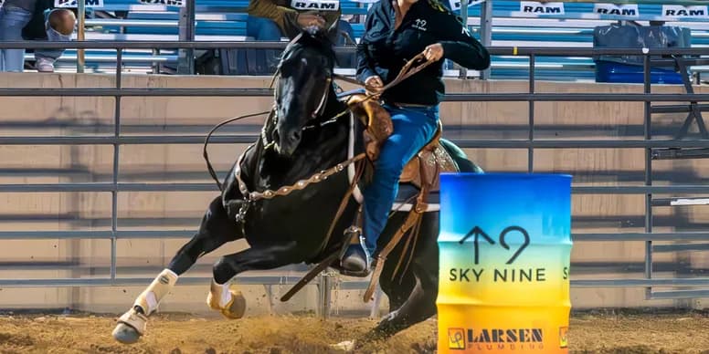 Competitor turning around a barrel